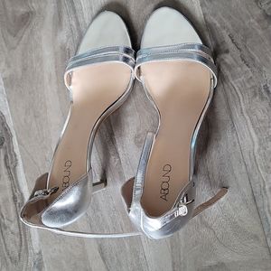 silver high heel shoes